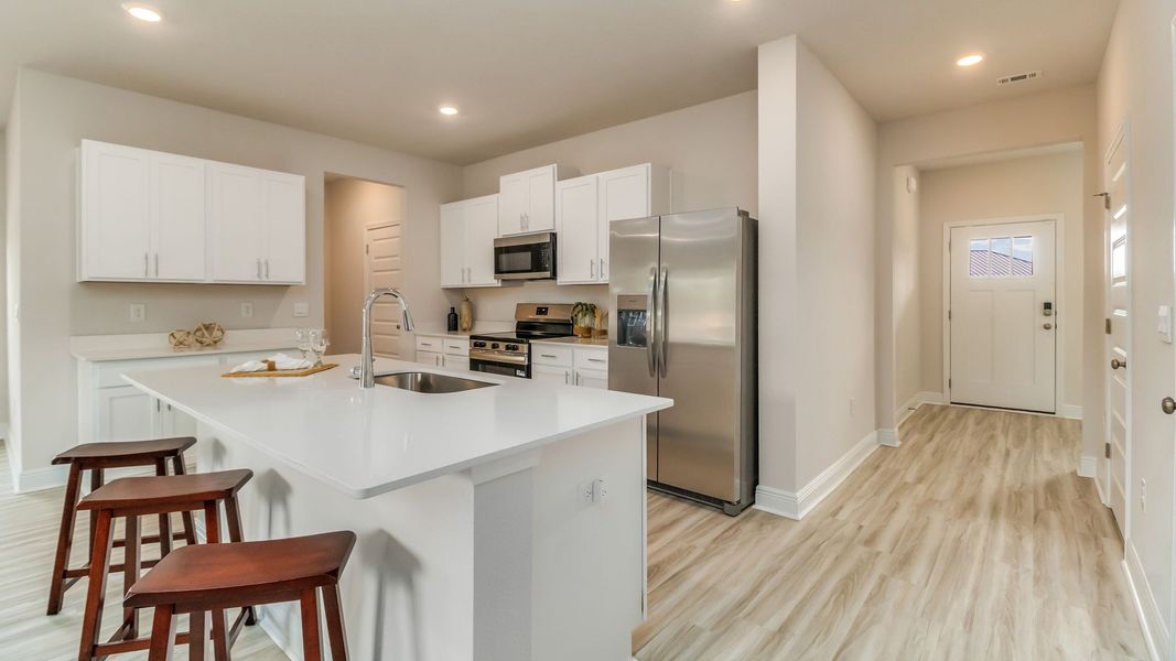 Furnished interior view inside a new home in Magnolia at the Bluffs Phase 3, Freeport (Image 8).
