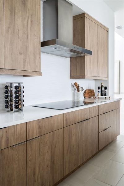 Kitchen of previously built Veranda Model home. Note: color selections and cabinet style may vary in this preconstruction home.