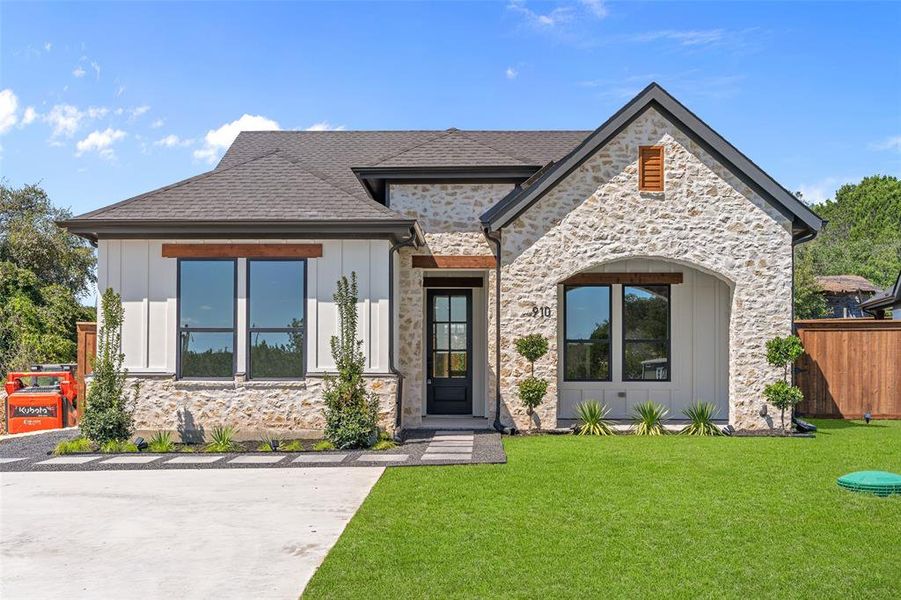 View of front of home with a front yard