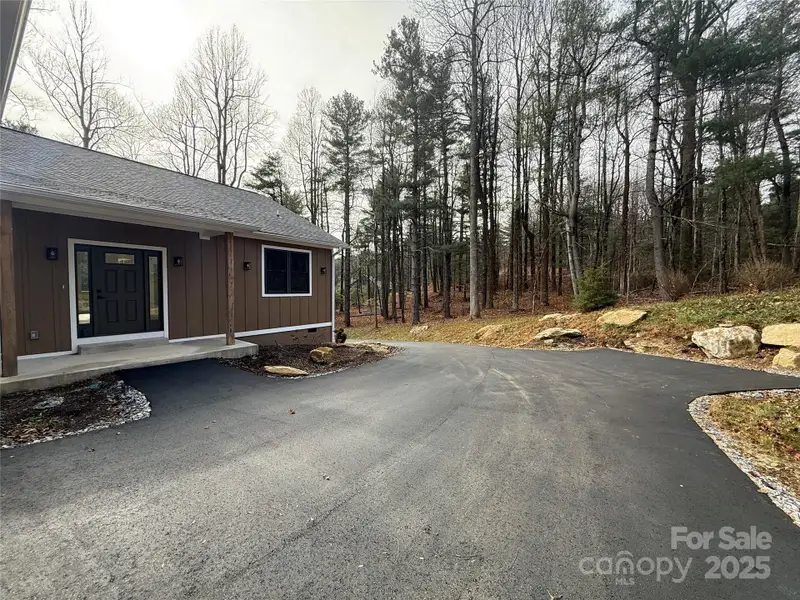 Exterior details and patio area of a home in , Flat Rock (Image 3).