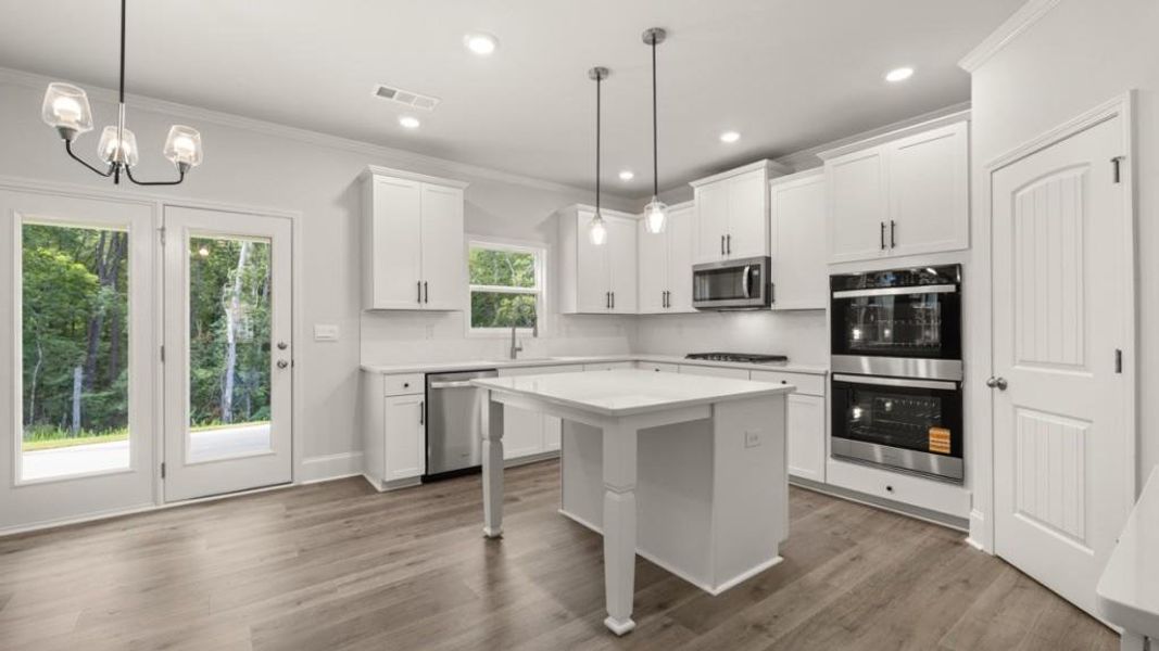 Furnished interior view inside a new home in Butner Estates, South Fulton (Image 2).