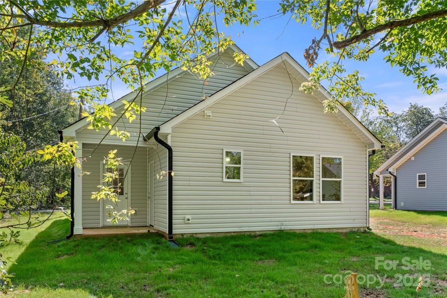 Front exterior of a new home in , Shelby, NC, highlighting curb appeal (Image 15).