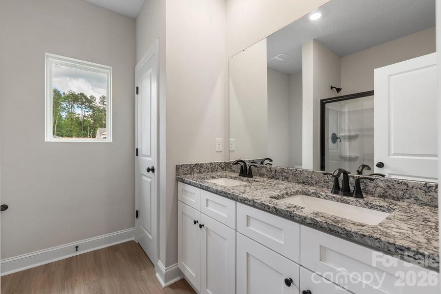 Furnished interior view inside a new home in Ascot Woods, Charlotte (Image 4).
