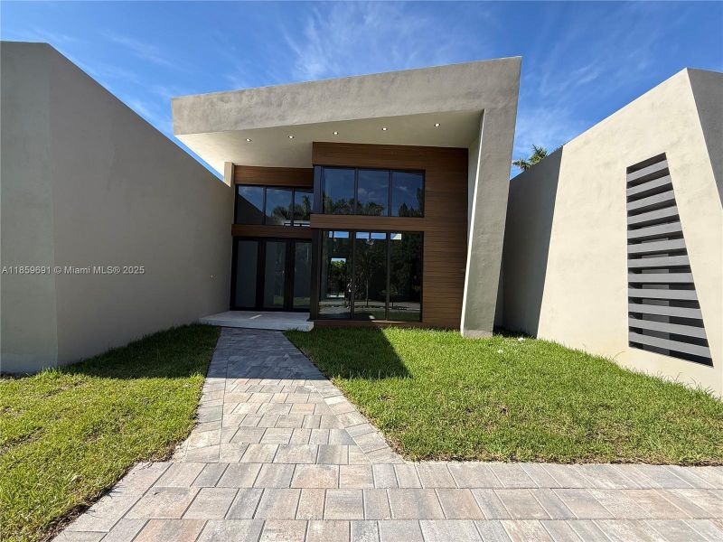 Front exterior of a new home in , Miami, FL, highlighting curb appeal (Image 28).
