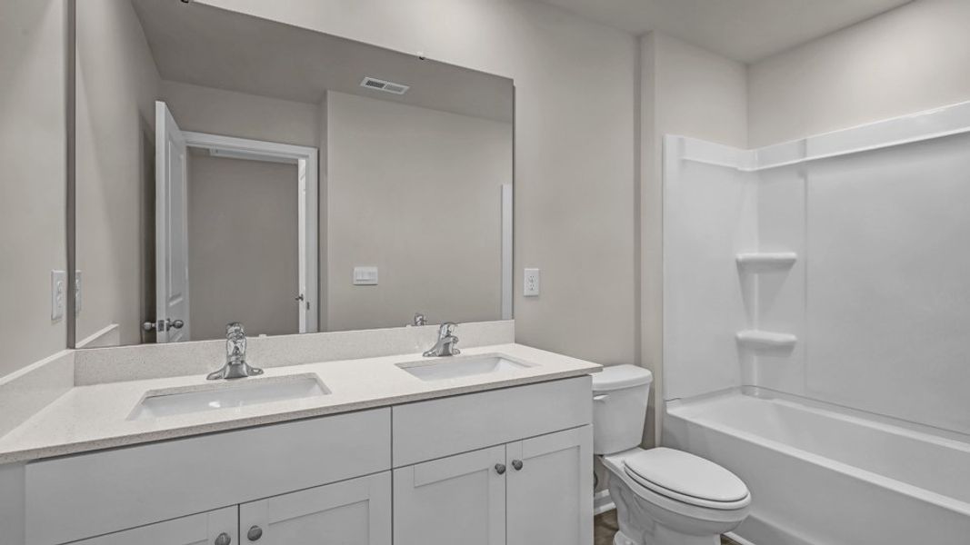 Furnished interior view inside a new home in Wilson's Ridge, Smithfield (Image 9).