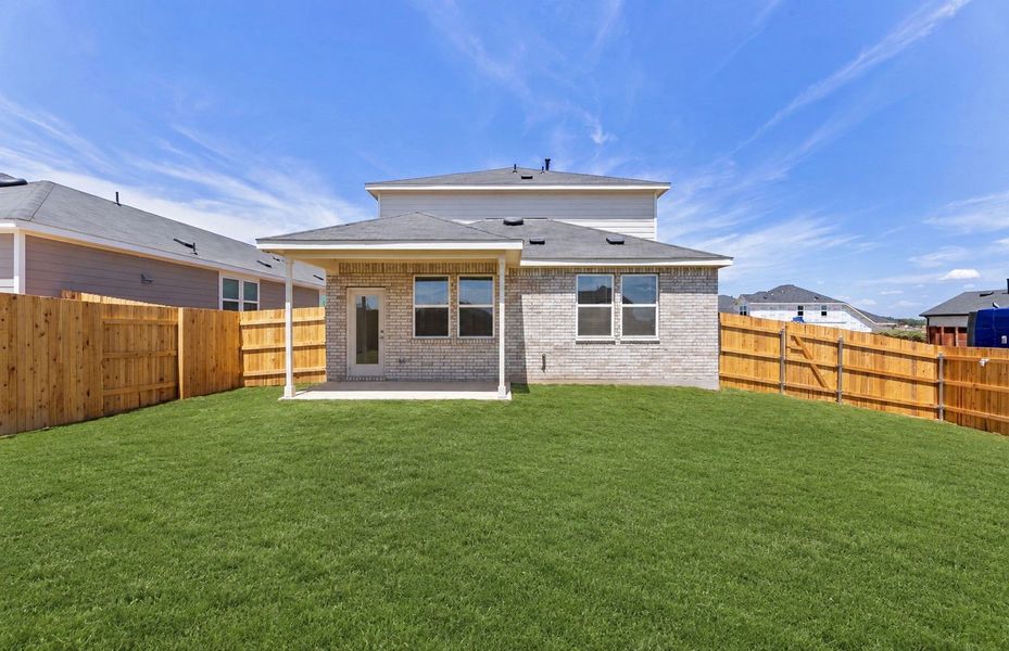 Exterior details and patio area of a home in Sunfield, Buda (Image 3). Exterior details and patio area of a home in Sunfield, Buda (Image 3).