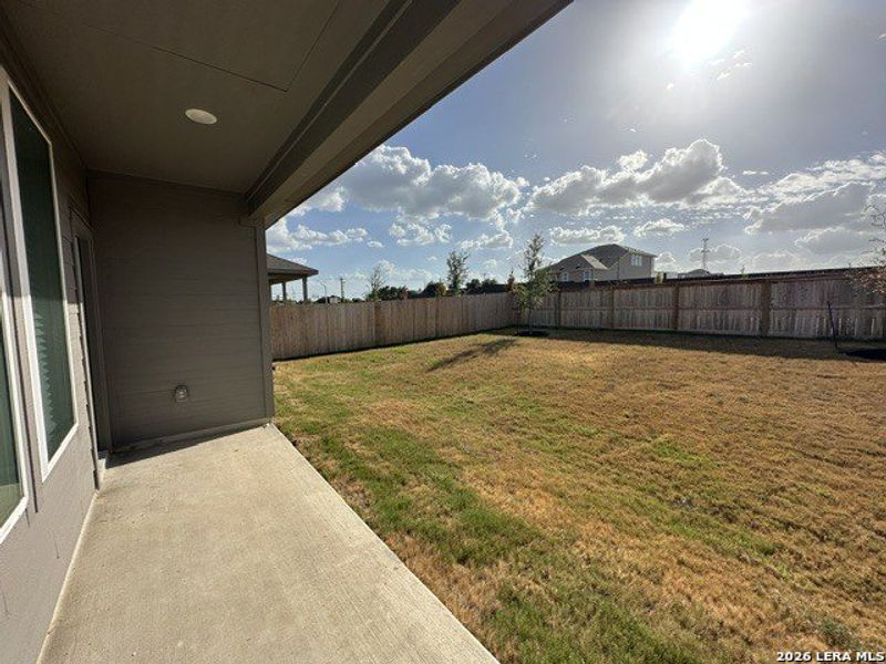 Exterior details and patio area of a home in Juniper Ranch, Spring Branch (Image 18).