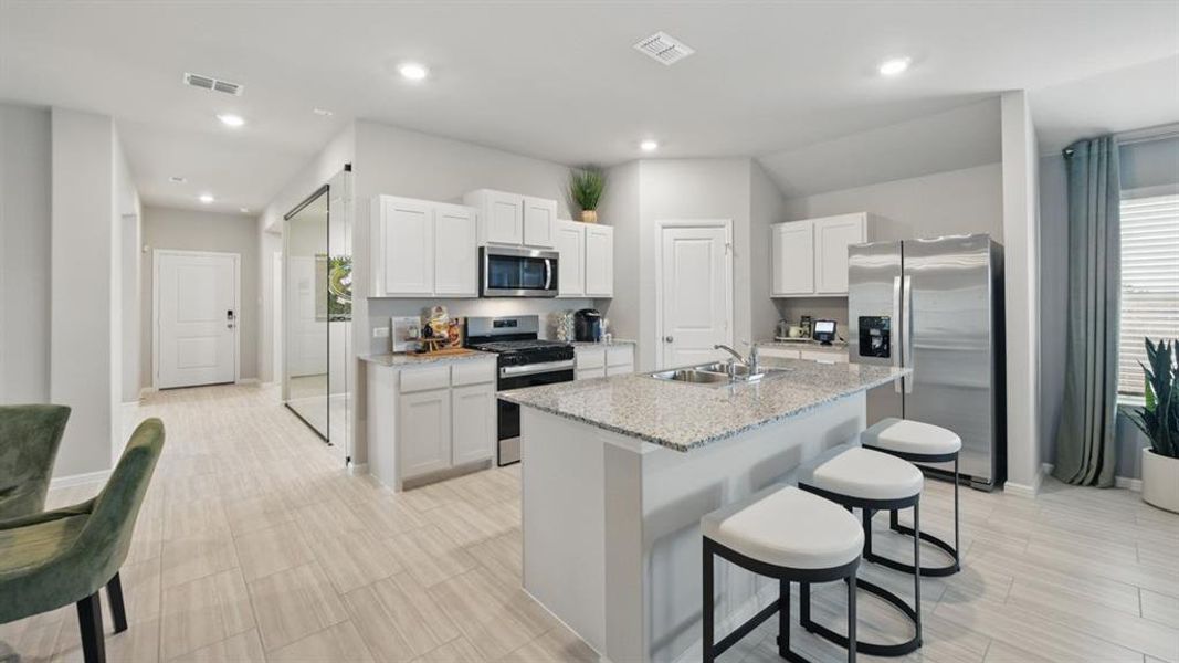 Kitchen-All Home and community information, including pricing, included features, terms, availability and amenities, are subject to change at any time without notice or obligation. All Drawings, pictures, photographs, video, square footages, floor plans, elevations, features, colors and sizes are approximate for illustration purposes only and will vary from the homes as built.