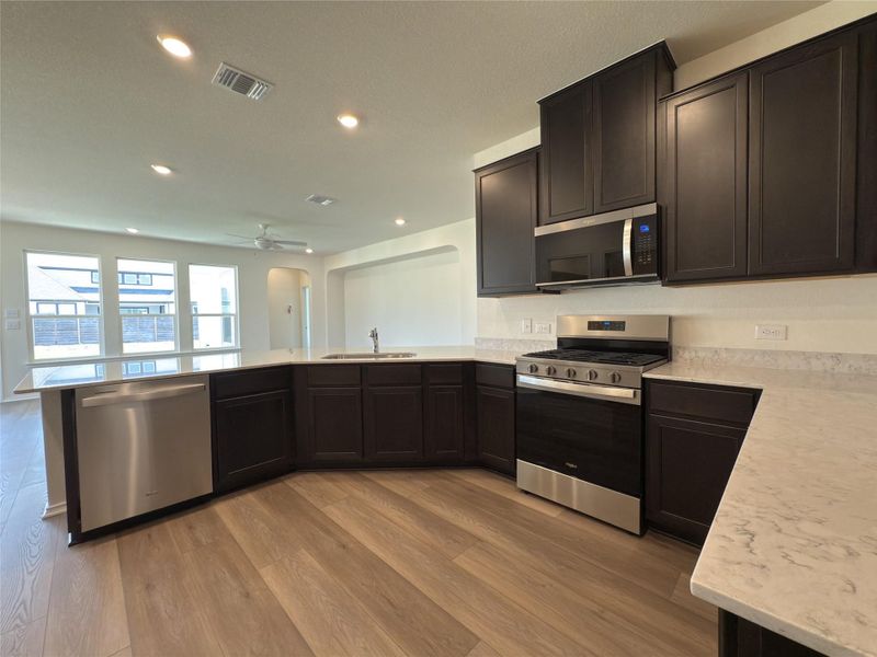 Furnished interior view inside a new home in River Bluff, Leander (Image 4). Furnished interior view inside a new home in River Bluff, Leander (Image 4).