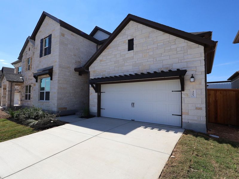 Exterior details and patio area of a home in Edgewood, Leander (Image 2). Exterior details and patio area of a home in Edgewood, Leander (Image 2).