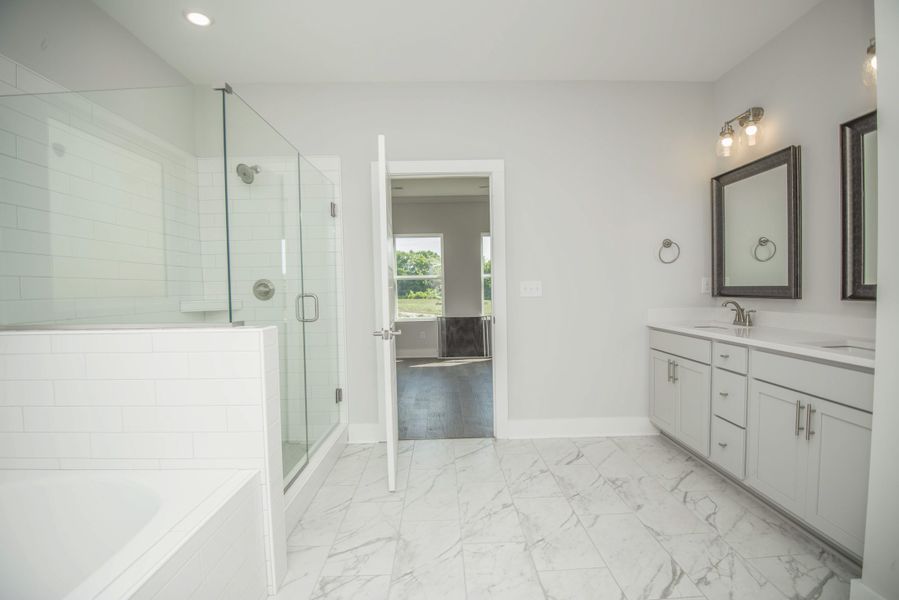 *Photo of example home. Selections and Finishes May Vary.* *Photo of example home. Selections and Finishes May Vary.*