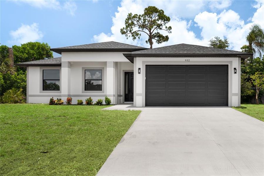 Front exterior of a new home in , Venice, FL, highlighting curb appeal (Image 16).