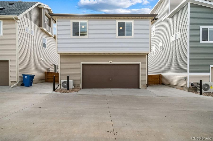 Exterior details and patio area of a home in Reunion, Commerce City (Image 21).