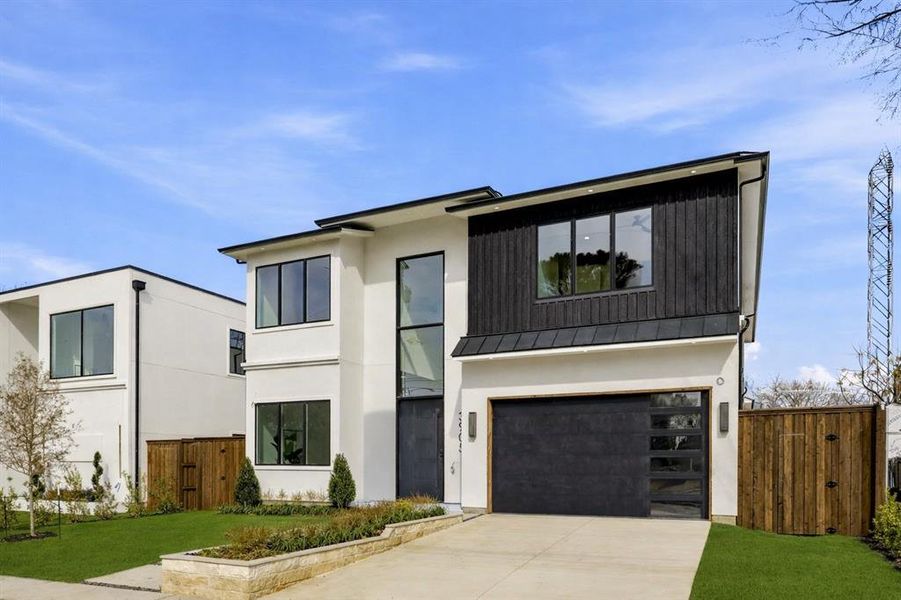 Front exterior of a new home in , Dallas, TX, highlighting curb appeal (Image 23).