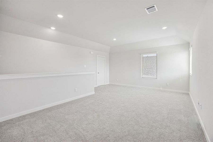 Game Room in the Stanley II home plan by Trophy Signature Homes – REPRESENTATIVE PHOTO