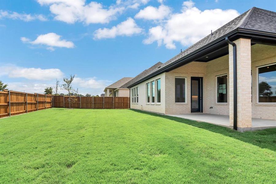 View of yard featuring a patio