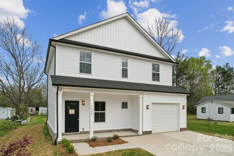Front exterior of a new home in , Rock Hill, SC, highlighting curb appeal (Image 16).