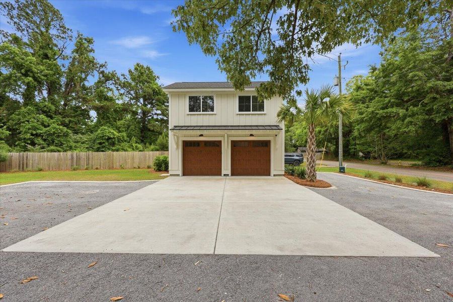 Front exterior of a new home in , Charleston, SC, highlighting curb appeal (Image 23).