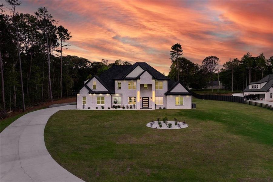 Front exterior of a new home in , Loganville, GA, highlighting curb appeal (Image 33).