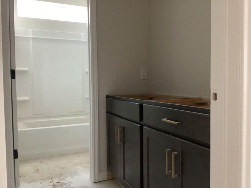 In-progress construction of a new home in The Cottages at Lariat, Liberty Hill, TX (Image 25).