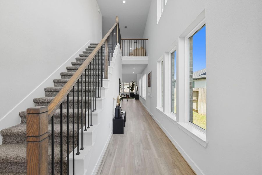 This wonderful entry welcomes you and your guests into your light and bright home - the perfect place for warm greetings on lingering goodbyes.