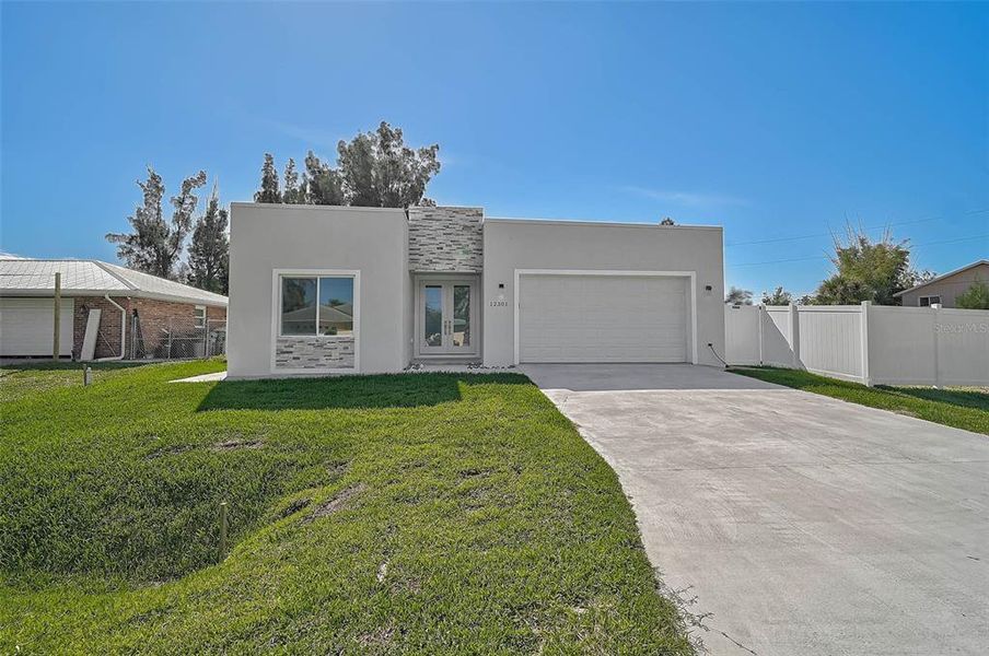 Exterior details and patio area of a home in , North Port (Image 21).