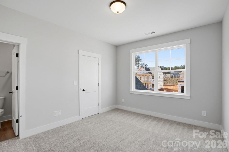 Spacious, unfurnished interior of a new home in Rone Creek, Waxhaw (Image 37).
