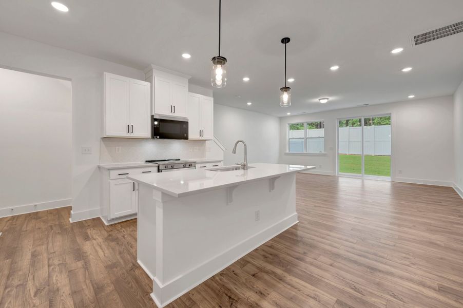 Furnished interior view inside a new home in Ashmore Townes, Garner (Image 8). Furnished interior view inside a new home in Ashmore Townes, Garner (Image 8).