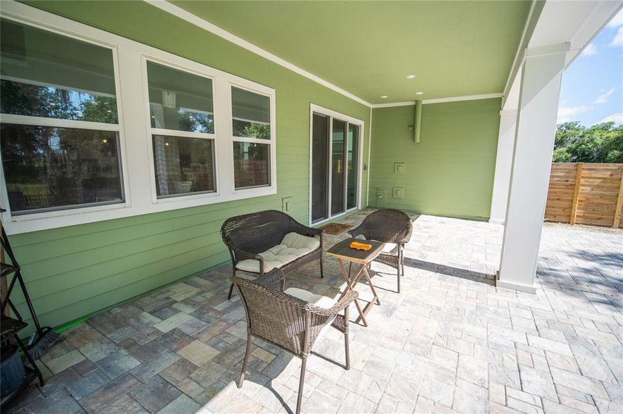 Exterior details and patio area of a home in Weslyn Park at Sunbridge, St. Cloud (Image 28).