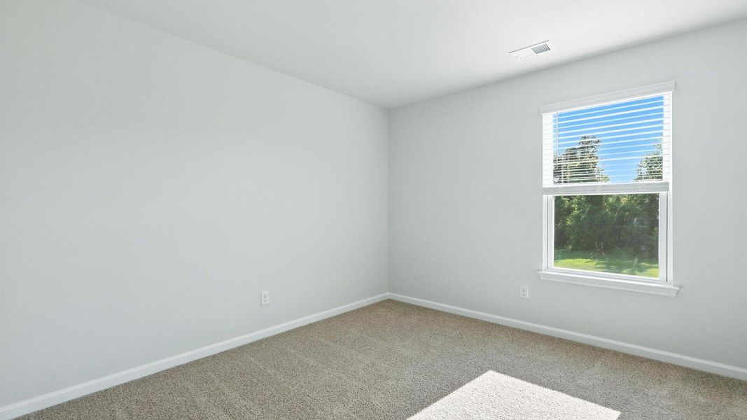 Spacious, unfurnished interior of a new home in The Ranch, Holly Hill (Image 17).