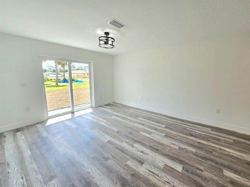 Spacious, unfurnished interior of a new home in , Port Charlotte (Image 16).