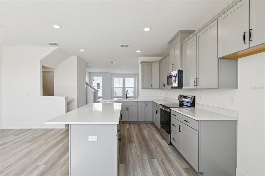 Furnished interior view inside a new home in Parkview at Hamlin, Winter Garden (Image 7). Furnished interior view inside a new home in Parkview at Hamlin, Winter Garden (Image 7).