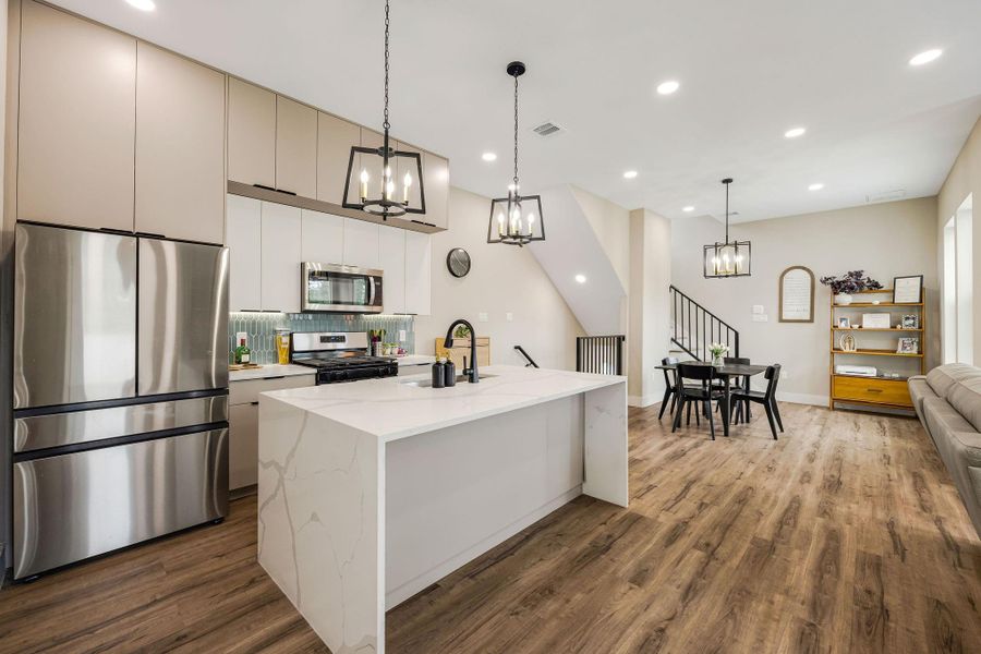 Open-concept layout connects the kitchen, dining, and living areas—ideal for entertaining. Open-concept layout connects the kitchen, dining, and living areas—ideal for entertaining.