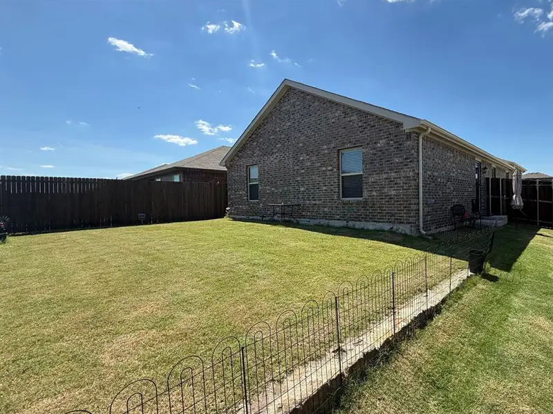Exterior details and patio area of a home in , Crandall (Image 24).