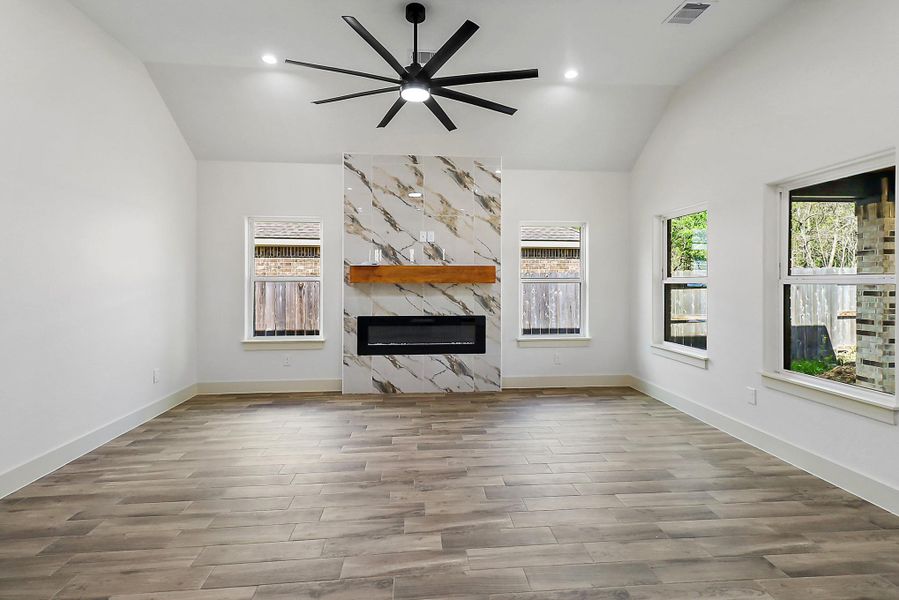 Spacious living room with built in fireplace