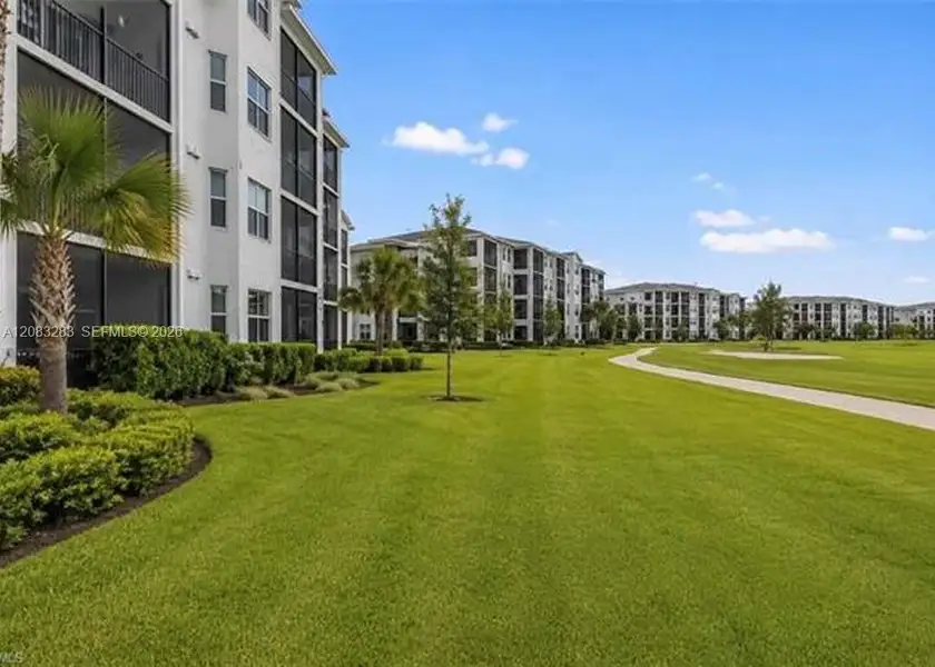 Condo located in Ave Maria, FL showcasing its design and architecture (Image 3).