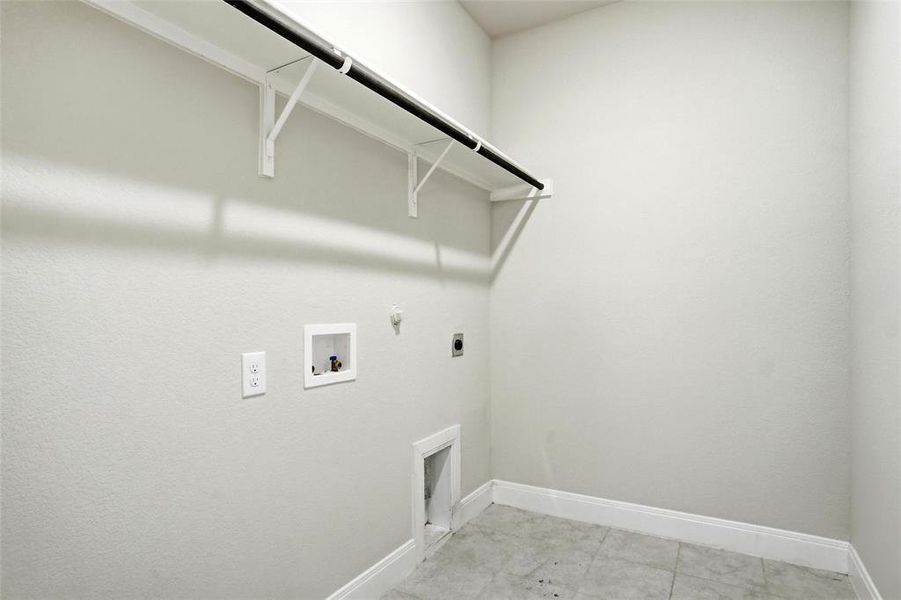 utility with hanging rod & space for 2nd fridge