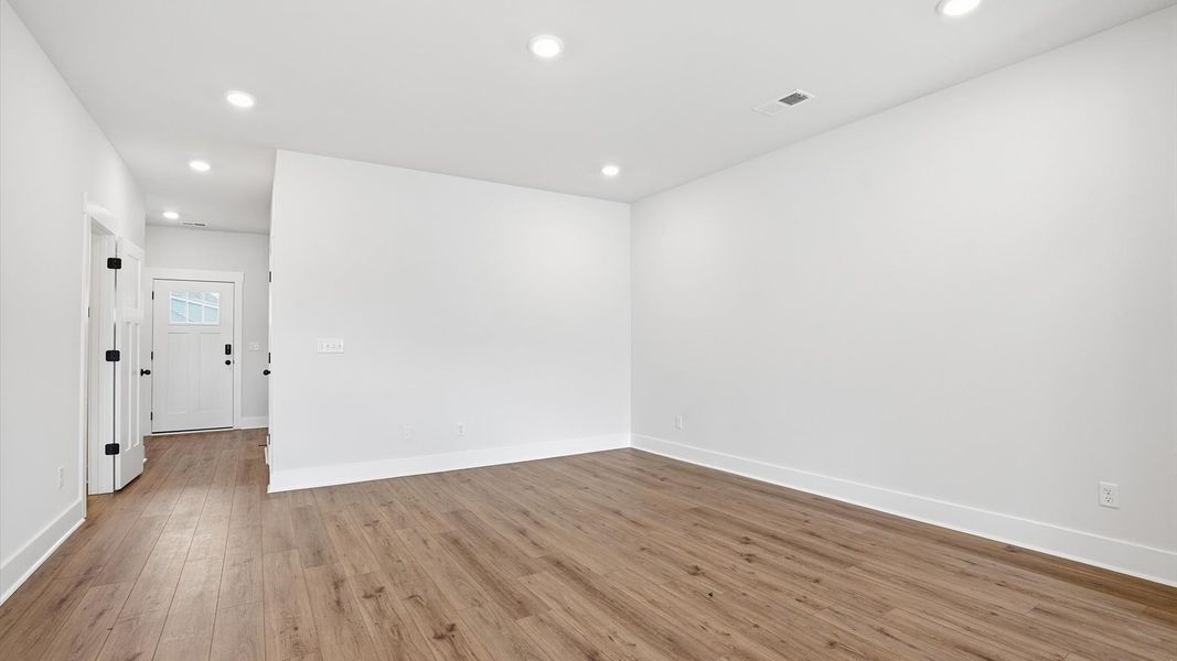 Memorable moments begin in this elegant, open family room with hardwood flooring and refined finishes Memorable moments begin in this elegant, open family room with hardwood flooring and refined finishes