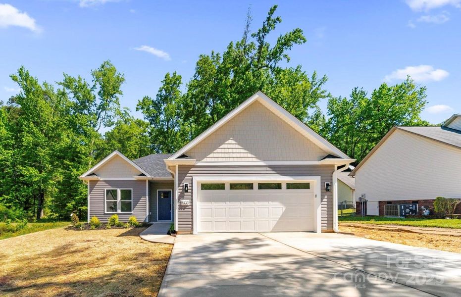 Front exterior of a new home in , Kannapolis, NC, highlighting curb appeal (Image 16). Front exterior of a new home in , Kannapolis, NC, highlighting curb appeal (Image 16).