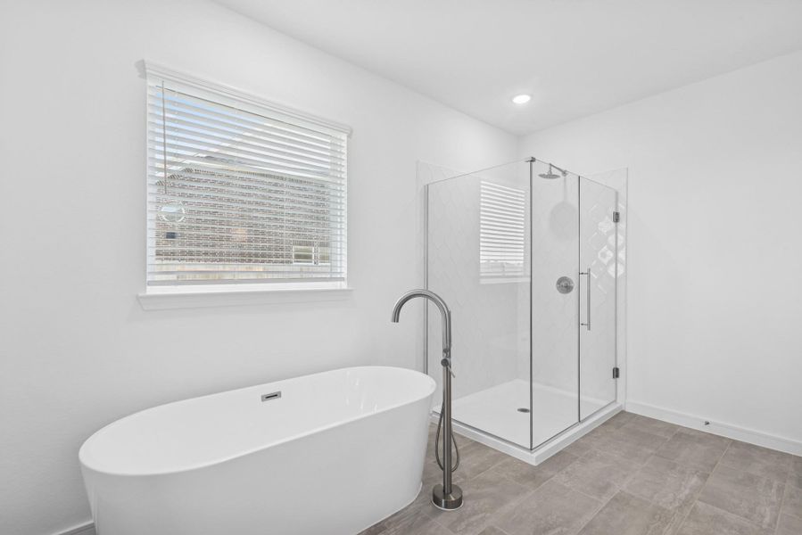 Luxurious freestanding tub and shower (*Photo not of actual home and used for illustration purposes only.)