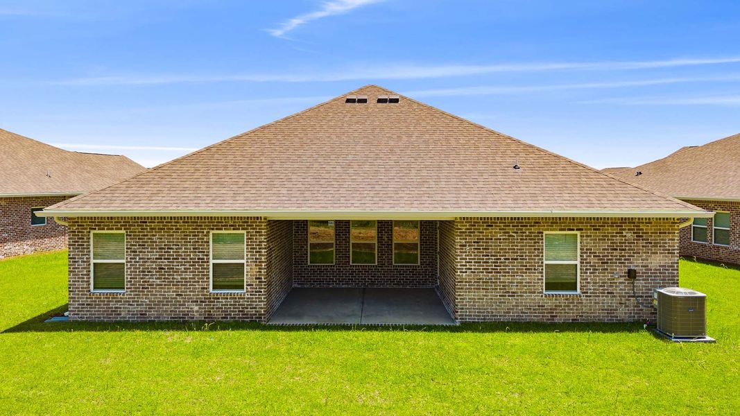 Exterior details and patio area of a home in Owl's Head Farms, Freeport (Image 3).