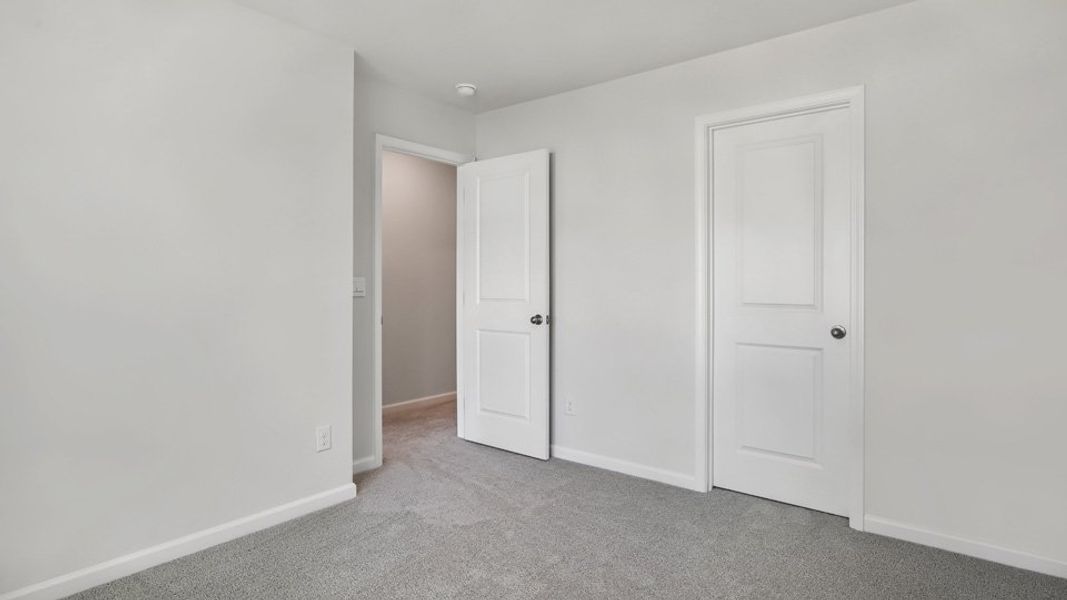 Spacious, unfurnished interior of a new home in Copper Run South, Durham (Image 20).