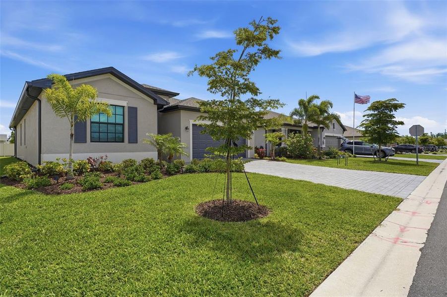 Front exterior of a new home in , Port Charlotte, FL, highlighting curb appeal (Image 22).