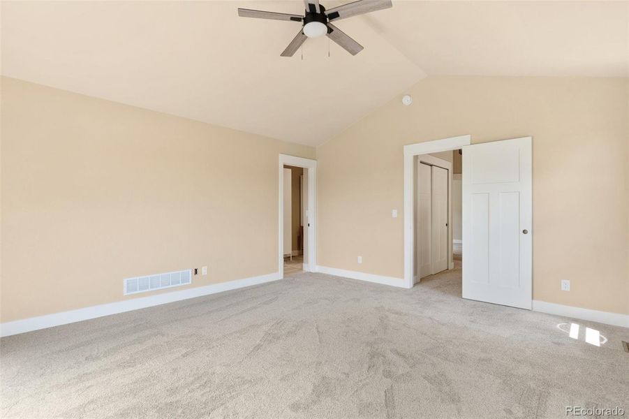 Primary bedroom suite with private balcony with stunning Front Range views and ensuite bathroom Primary bedroom suite with private balcony with stunning Front Range views and ensuite bathroom