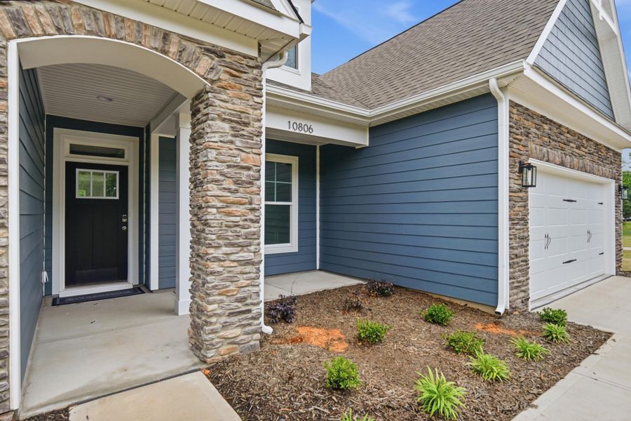 Exterior details and patio area of a home in Chasewood, Mint Hill (Image 2). Exterior details and patio area of a home in Chasewood, Mint Hill (Image 2).
