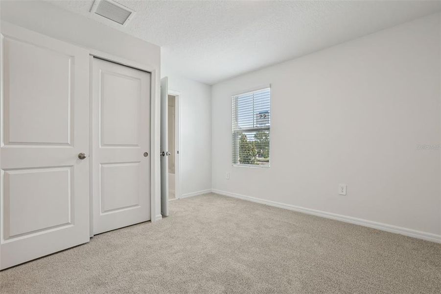 Spacious, unfurnished interior of a new home in Bradford Park, Ormond Beach (Image 18).