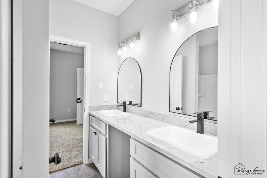 Jack and Jill Bathroom from Bedroom 2 Granite countertop Jack and Jill Bathroom from Bedroom 2 Granite countertop