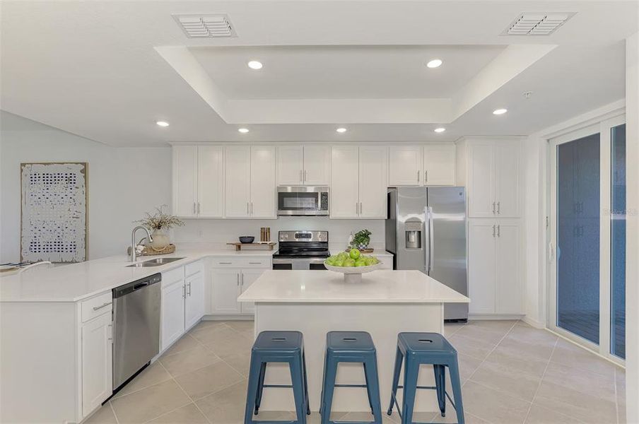 Furnished interior view inside a new home in Wellen Park Golf & Country Club, Venice (Image 18).