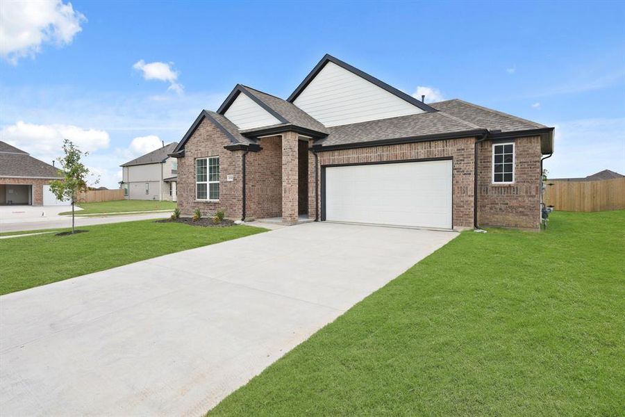 Front exterior of a new home in Rocky Creek Crossing, Fort Worth, TX, highlighting curb appeal (Image 12).