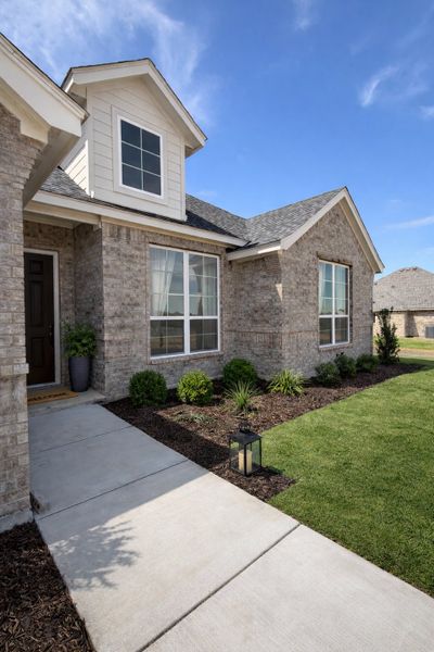 Front exterior of a new home in Terra Vista Estates, Springtown, TX, highlighting curb appeal (Image 16).